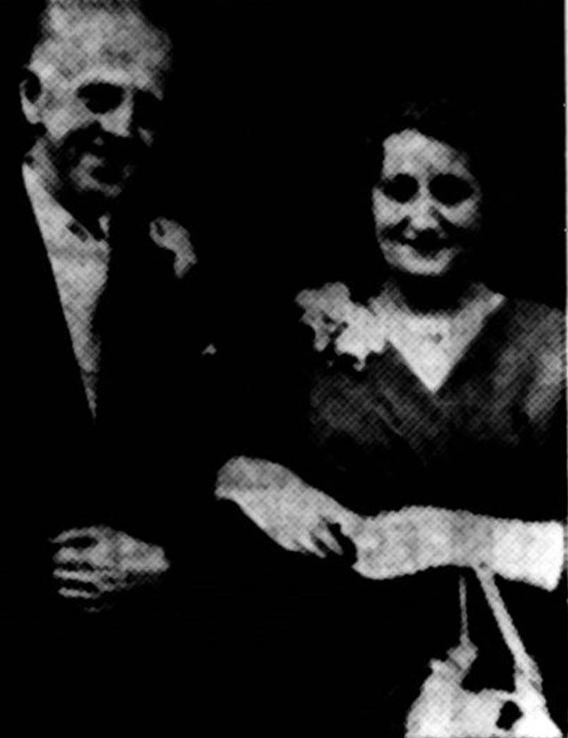 A newspaper article with a picture of a person's hand
Description automatically generated